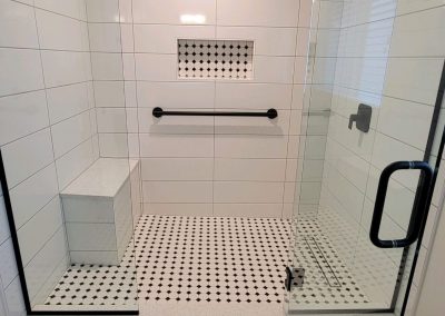 white and black tile shower