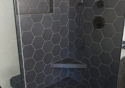 black hexagon shower tile